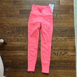 Neon pink athletic tights